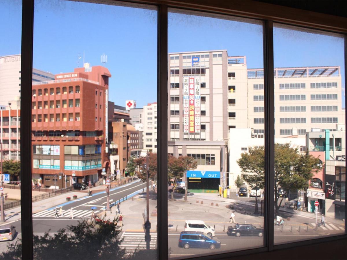 Hostel Tangatable Kitakyushu Esterno foto