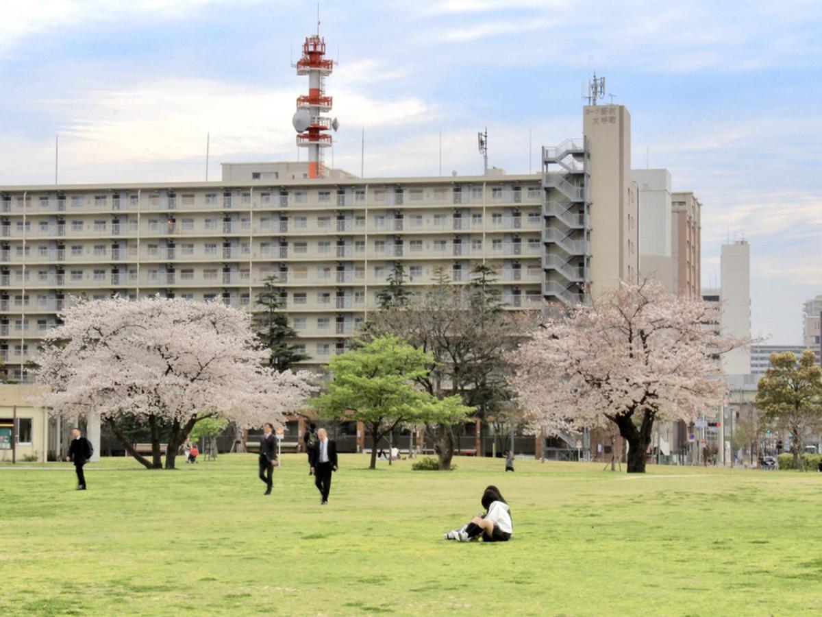 Hostel Tangatable Kitakyushu Esterno foto